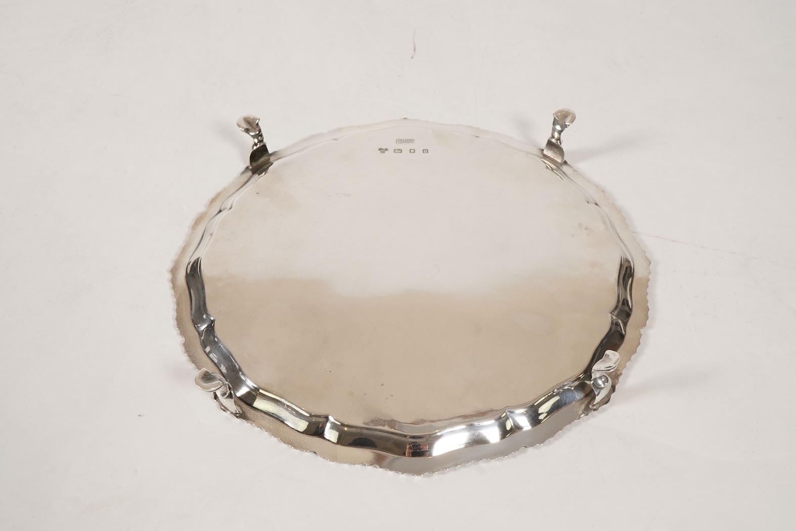 A George V silver salver, by Harrods Ltd